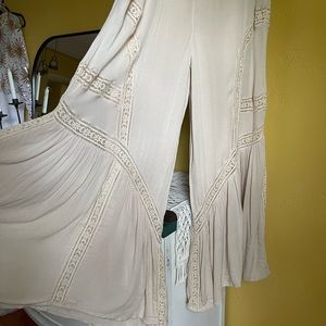 Free people flare pants with lace detail
